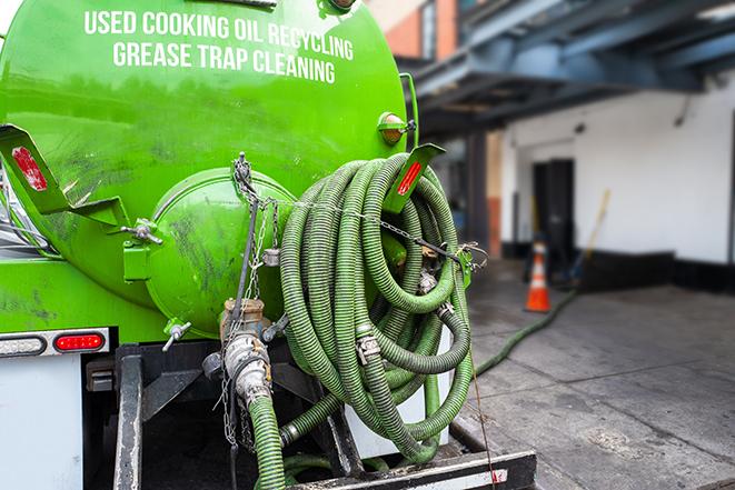 pumping out excess grease and waste from a restaurant's trap in San Fernando CA